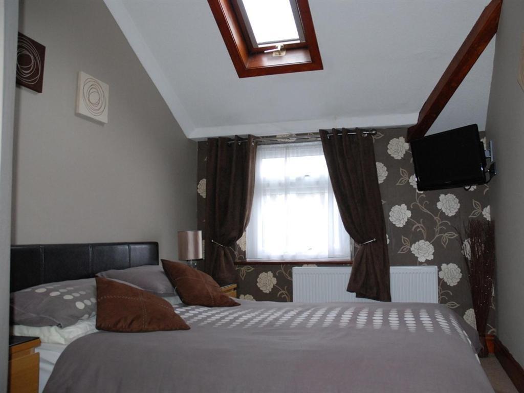 Tanes Hotel Cardiff Rom bilde