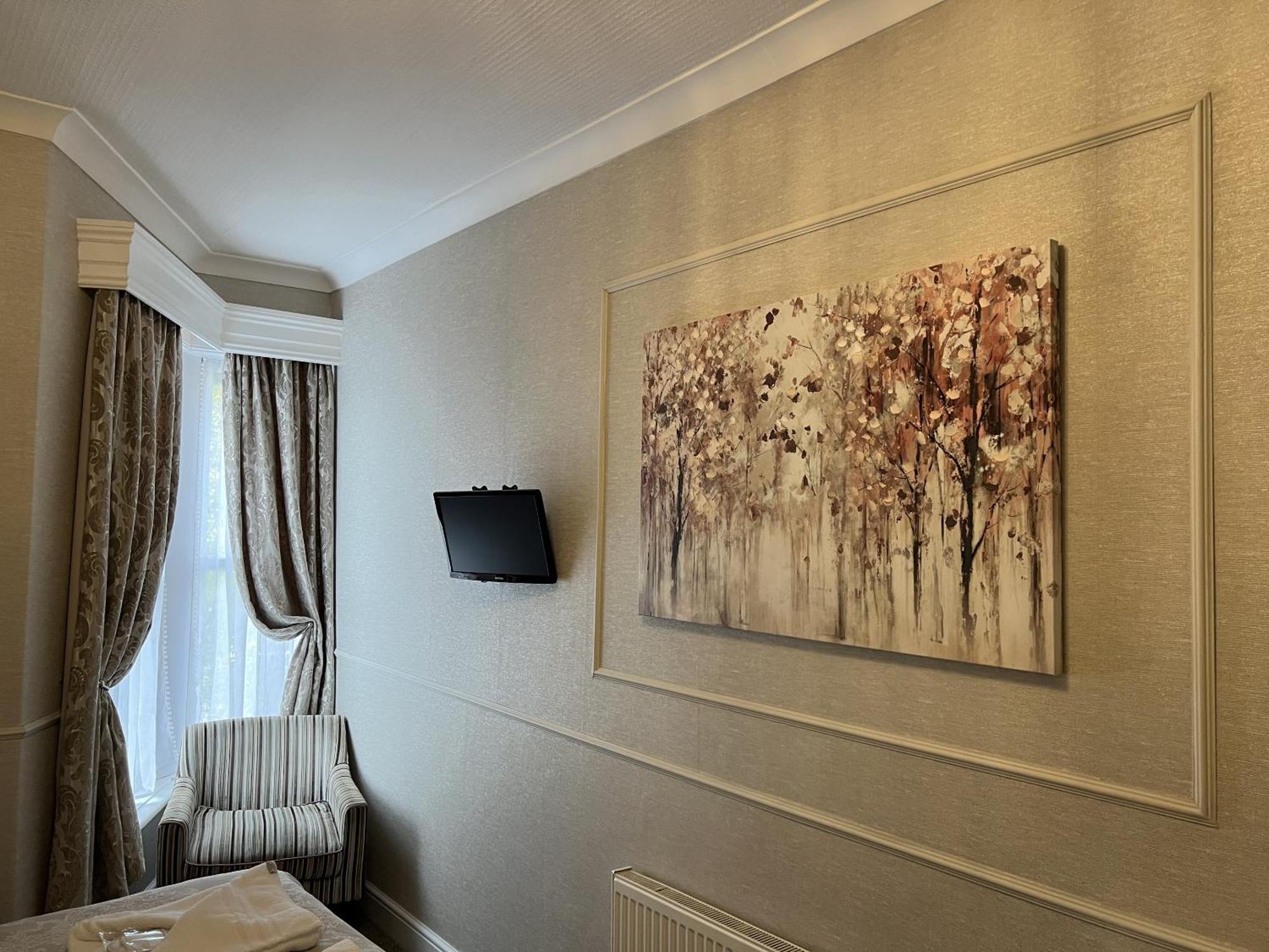 Tanes Hotel Cardiff Rom bilde